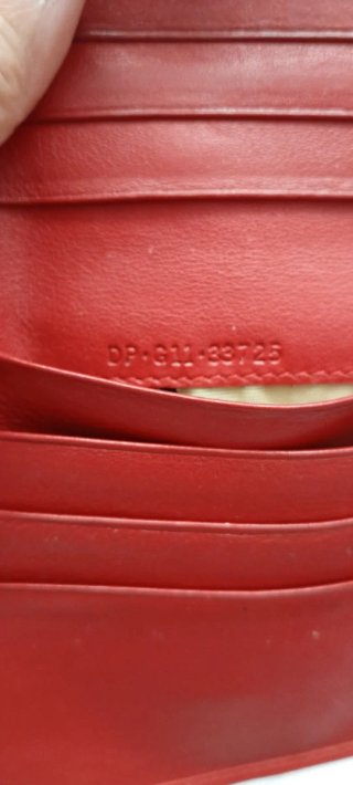 Portafoglio donna Bulgari rosso con cerchio dorato