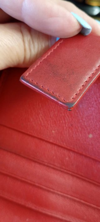 Portafoglio donna Bulgari rosso con cerchio dorato