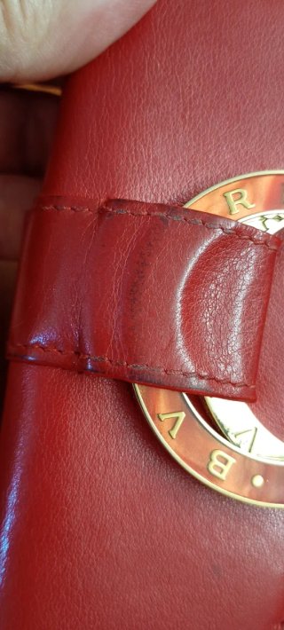 Portafoglio donna Bulgari rosso con cerchio dorato