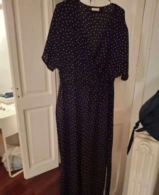 Mono negro con lunares blancos talla L