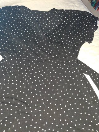 Mono negro con lunares blancos talla L