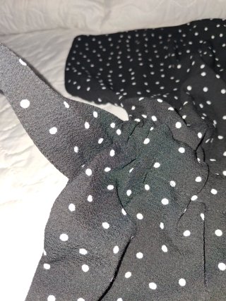 Mono negro con lunares blancos talla L