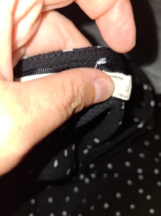 Mono negro con lunares blancos talla L
