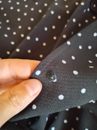Mono negro con lunares blancos talla L