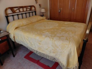 Cama de hierro forjado y latón