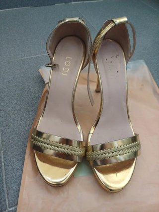 Sandalias LODI doradas tacón alto