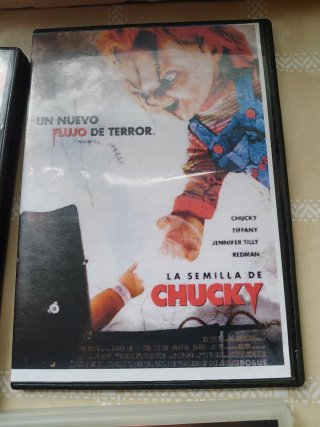 4 DVDs: El Poder Estino, Chucky, Piratas Caribe II