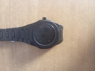Reloj de aguja negro