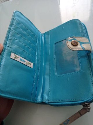 Cartera Roxy floral azul y blanco