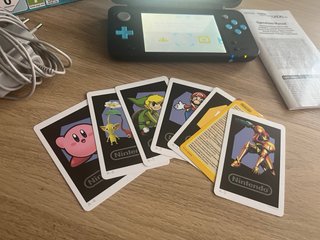 Nintendo 2DS XL con scatola di ricarica completa