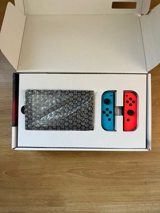 Nintendo Switch Completa Azul/Rojo + ACCESORIOS