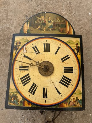 Reloj de pared ratera antiguo