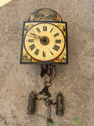Reloj de pared ratera antiguo