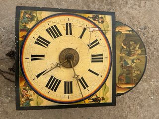 Reloj de pared ratera antiguo