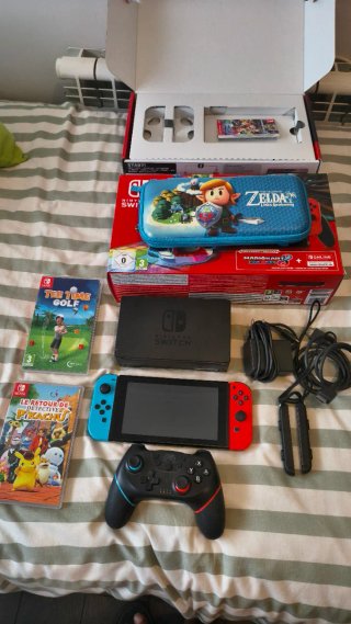 Nintendo switch+ 2 juegos + mando+ funda