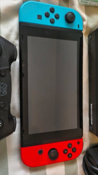 Nintendo switch+ 2 juegos + mando+ funda