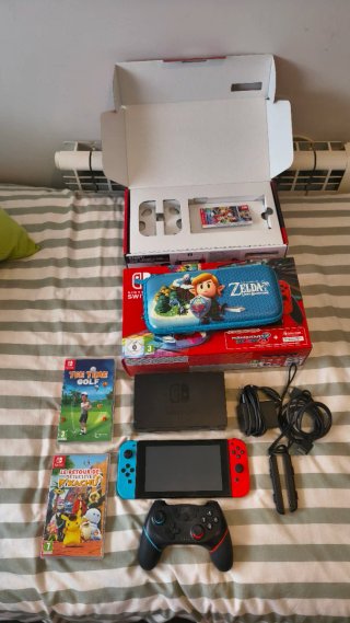 Nintendo switch+ 2 juegos + mando+ funda