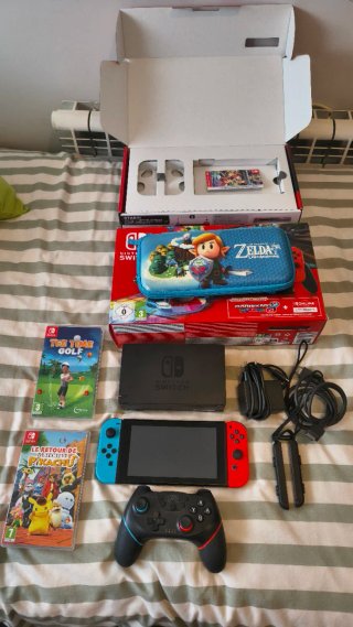 Nintendo switch+ 2 juegos + mando+ funda