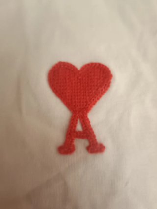 Camiseta AMI Paris blanca con corazón