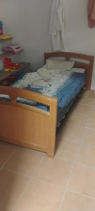 Cama nido de madera y tela