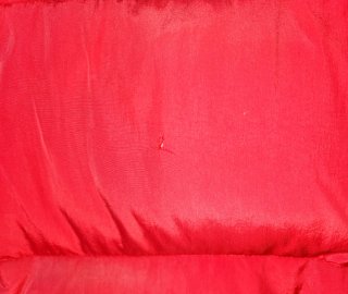 Chaleco plumífero rojo marca Tommy Hilfiger