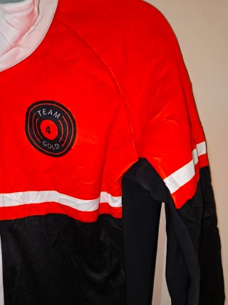 Chaqueta Fila Hombre Naranja y Negra