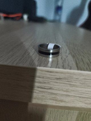 Anillo de acero inoxidable plateado