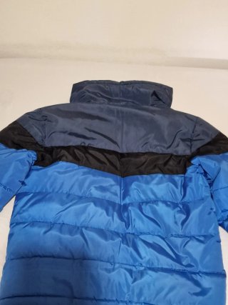 Cazadora Karl Kani azul y negra
