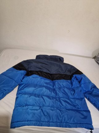 Cazadora Karl Kani azul y negra
