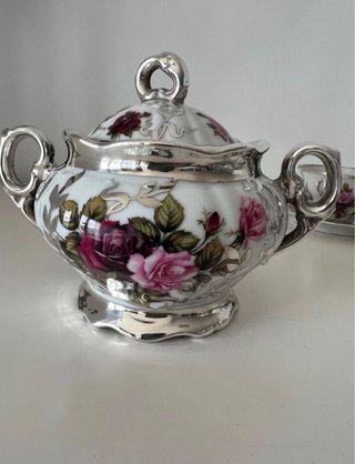 Juego de café de plata y porcelana