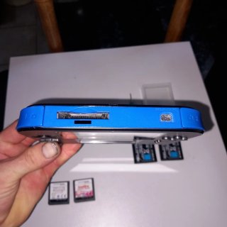 Nintendo 2DS amb extres.