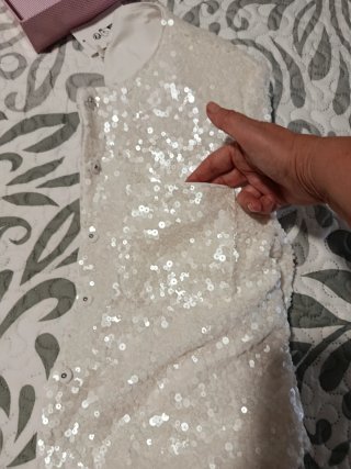 Chaqueta de lentejuelas blancas