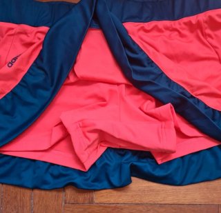 Falda pantalón pádel Adidas naranja y verde