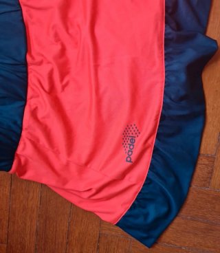 Falda pantalón pádel Adidas naranja y verde