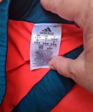 Falda pantalón pádel Adidas naranja y verde