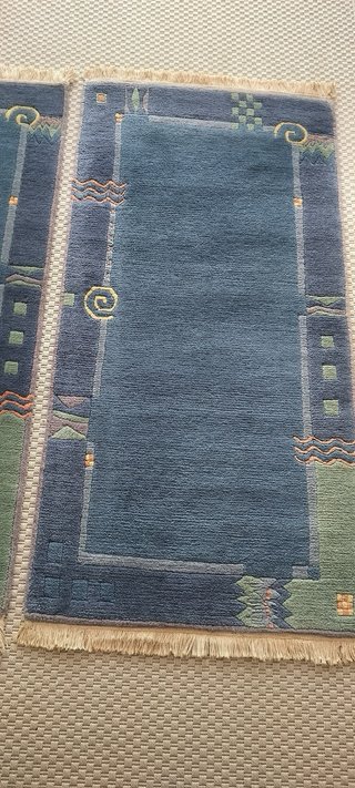 Alfombras de lana azul y verde