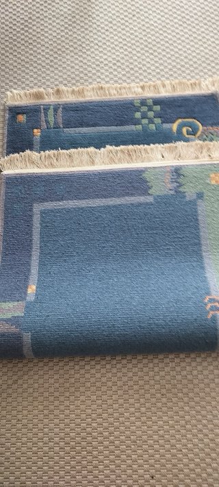 Alfombras de lana azul y verde