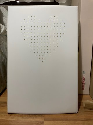 Minicuna de madera blanca con ruedas