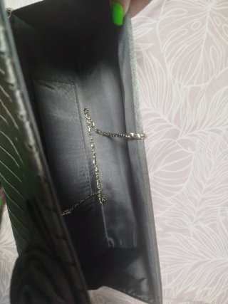 Bolso de fiesta plateado con flor