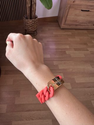 Pulsera Bimba y Lola dorada y goma naranja