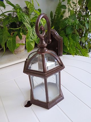 Farol de forja y cristal