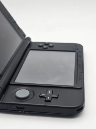Nintendo 3DS XL sd64gb a tema Charizard con Giochi