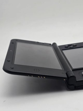 Nintendo 3DS XL sd64gb a tema Charizard con Giochi