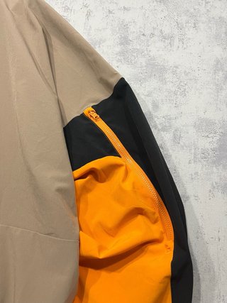 Chaqueta teack jacket Adidas negra y naranja