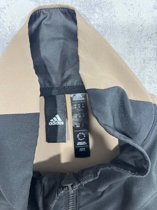 Chaqueta teack jacket Adidas negra y naranja
