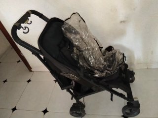 Carro Cybex niño con funda plástico
