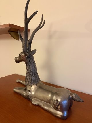 Figura ciervo metal plateado