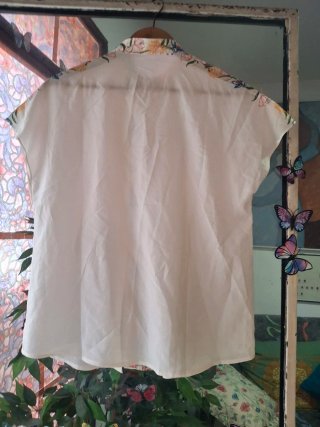 Blusa estilo asiático bordada