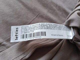 Camiseta beige con estampado de setas