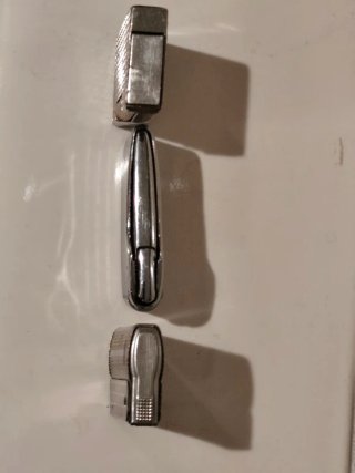 3 accendini vintage in argento